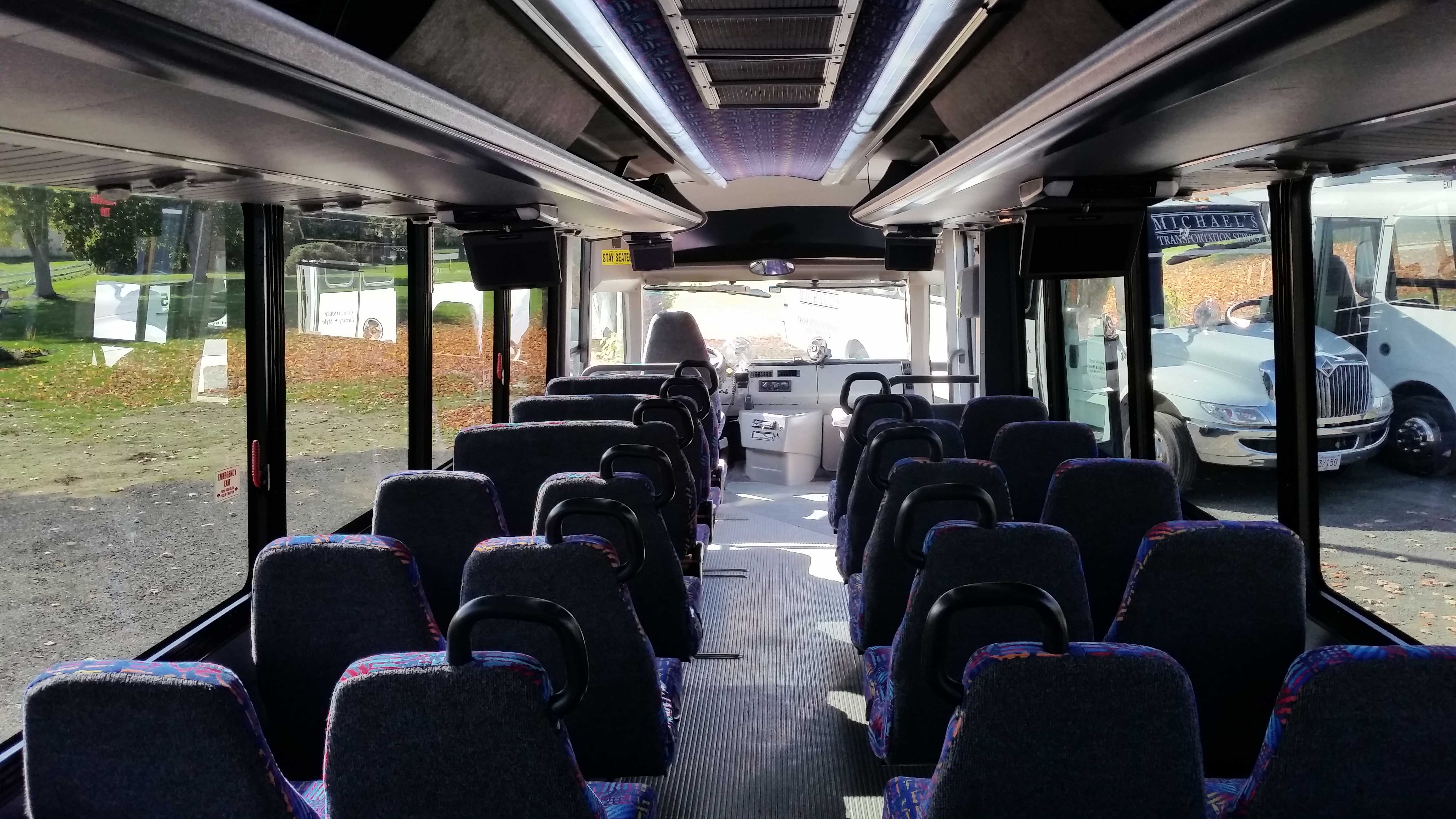 You Are Comfortably Seated On A Bus Full Of Passengers 29/35 Passenger – Handicap Accessible Mini Bus – Michael’s Limousines